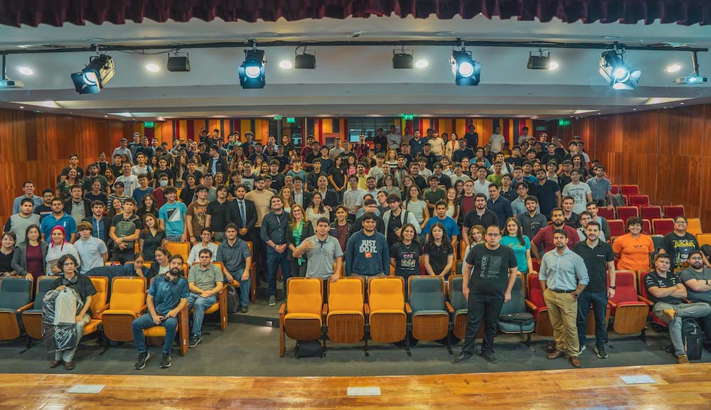 A large group of people in an auditorium